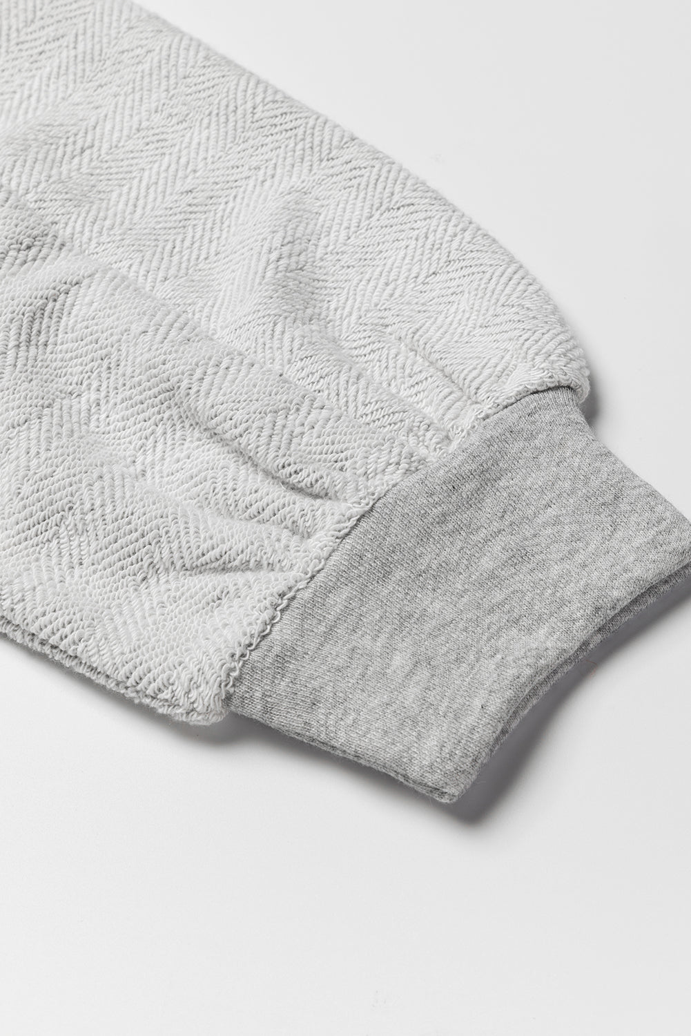 White Textured Side Pockets Buttoned Neckline Sweatshirt